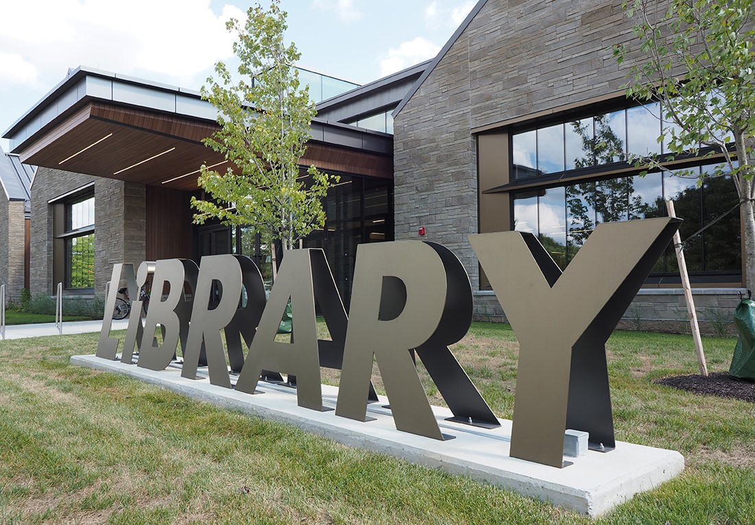 Library metal signage in front of the new Appoquinimink Library in Middletown, DE